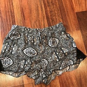 Black patterned shorts with lace trim